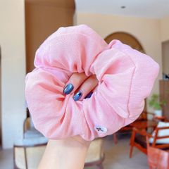 ** Scrunchies bông phồng tone pastel logo nơ đen nhỏ