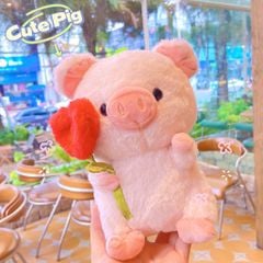 ** GẤU BÔNG HEO HỒNG CẦM TIM ĐỎ 25CM