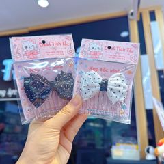 ** Kẹp xược nơ bướm chấm bi trắng/đen
