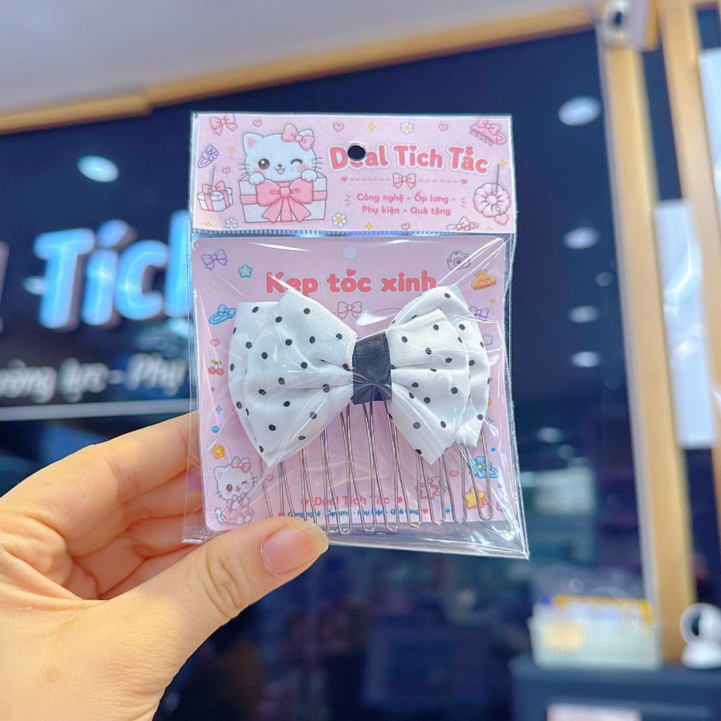 ** Kẹp xược nơ bướm chấm bi trắng/đen