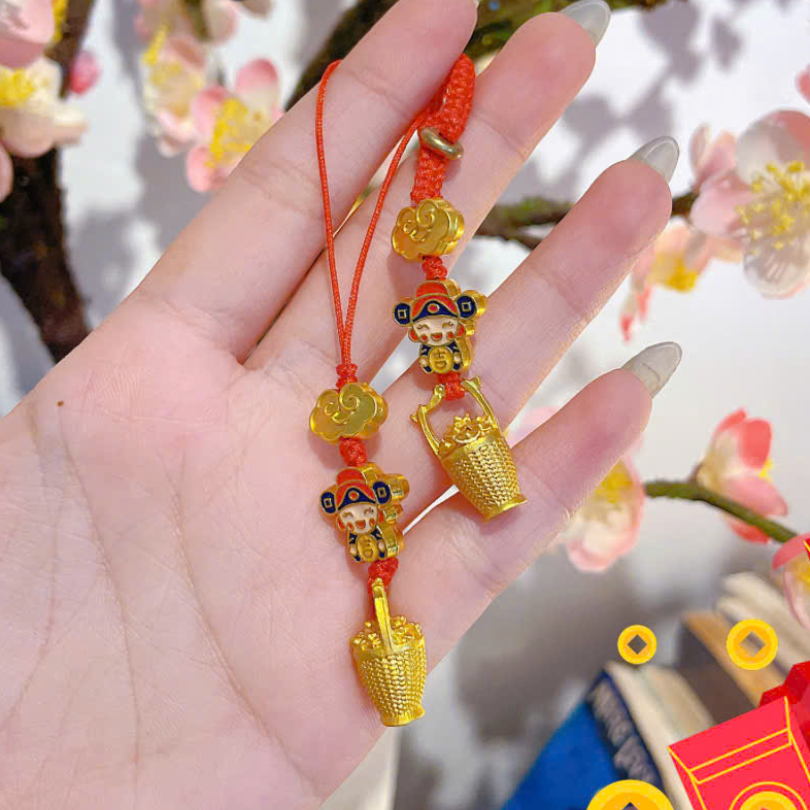 ** Dây đeo điện thoại thần tài và hủ vàng