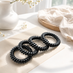 ** Set 4 cột tóc lò xo màu đen
