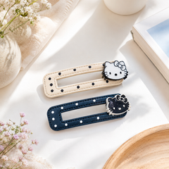 ** Set 2 kẹp màu kitty đen chấm bi
