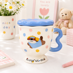 ** Cốc sứ cún Lạp xưởng xanh kèm muỗng tay cầm xanh