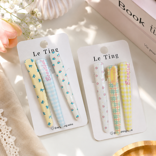 ** Set 3 kẹp mỏ vịt vàng/kem/XD họa tiết caro/hoa/nơ nhí