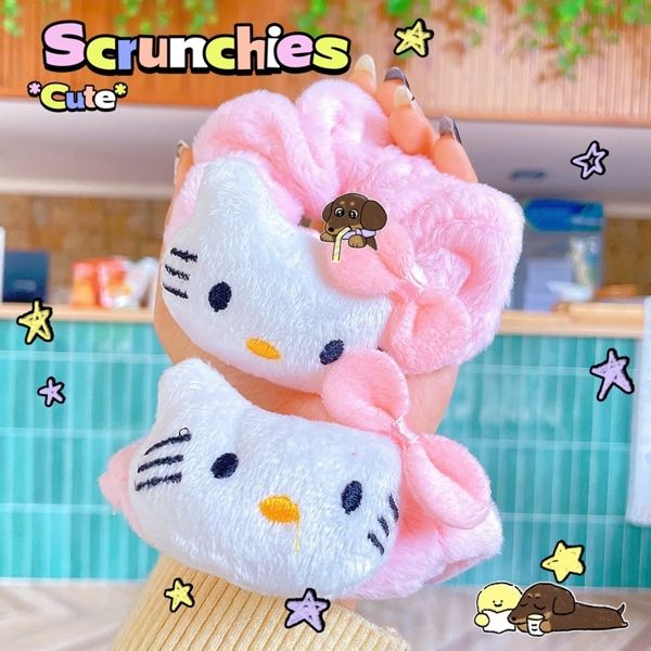 ** Scrunchies lông charm bông Kitty nơ hồng