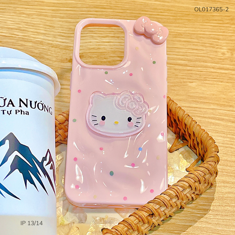** Ốp iPhone 13/14 dẻo gồ ghề đính mặt Kitty và Nơ