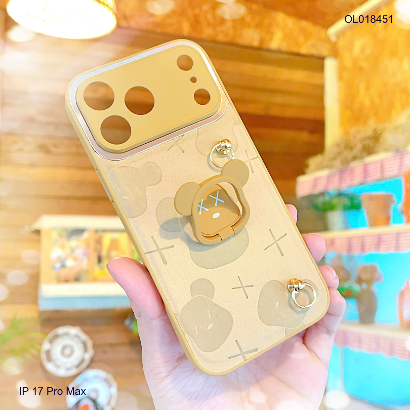 ** Ốp IP 17 Pro Max vân da nâu gấu bearbrick kèm dây đeo