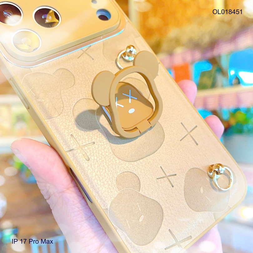 ** Ốp IP 17 Pro Max vân da nâu gấu bearbrick kèm dây đeo