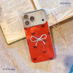 Ốp IP 17 Pro Max vân đá nền đỏ đính nơ bạc