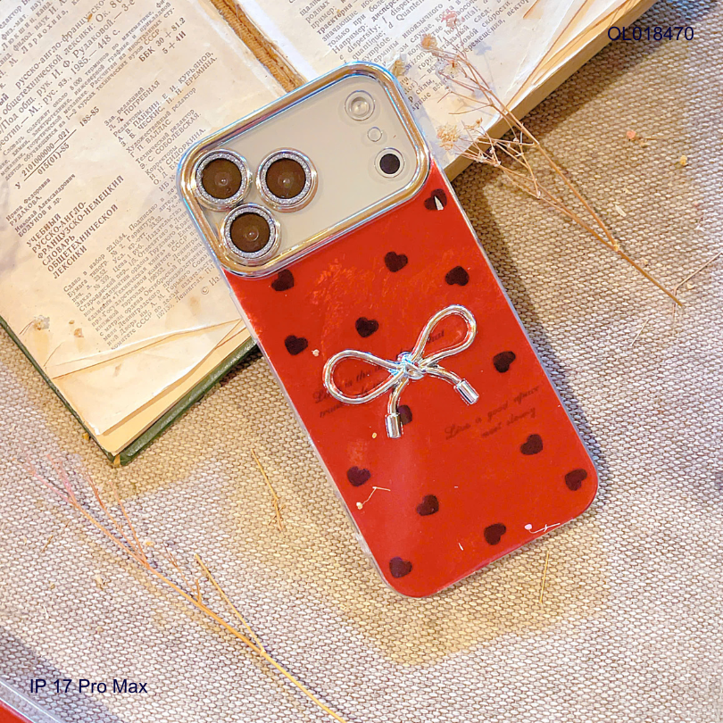 Ốp IP 17 Pro Max vân đá nền đỏ đính nơ bạc