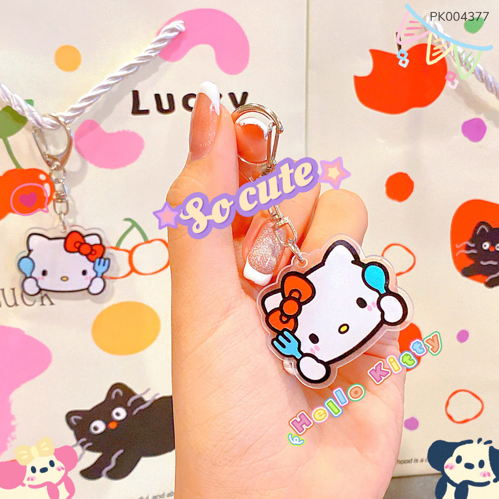 ** Móc khóa mica in Kitty nơ đỏ cầm nĩa xanh