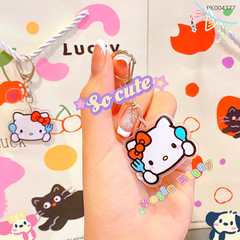 ** Móc khóa mica in Kitty nơ đỏ cầm nĩa xanh