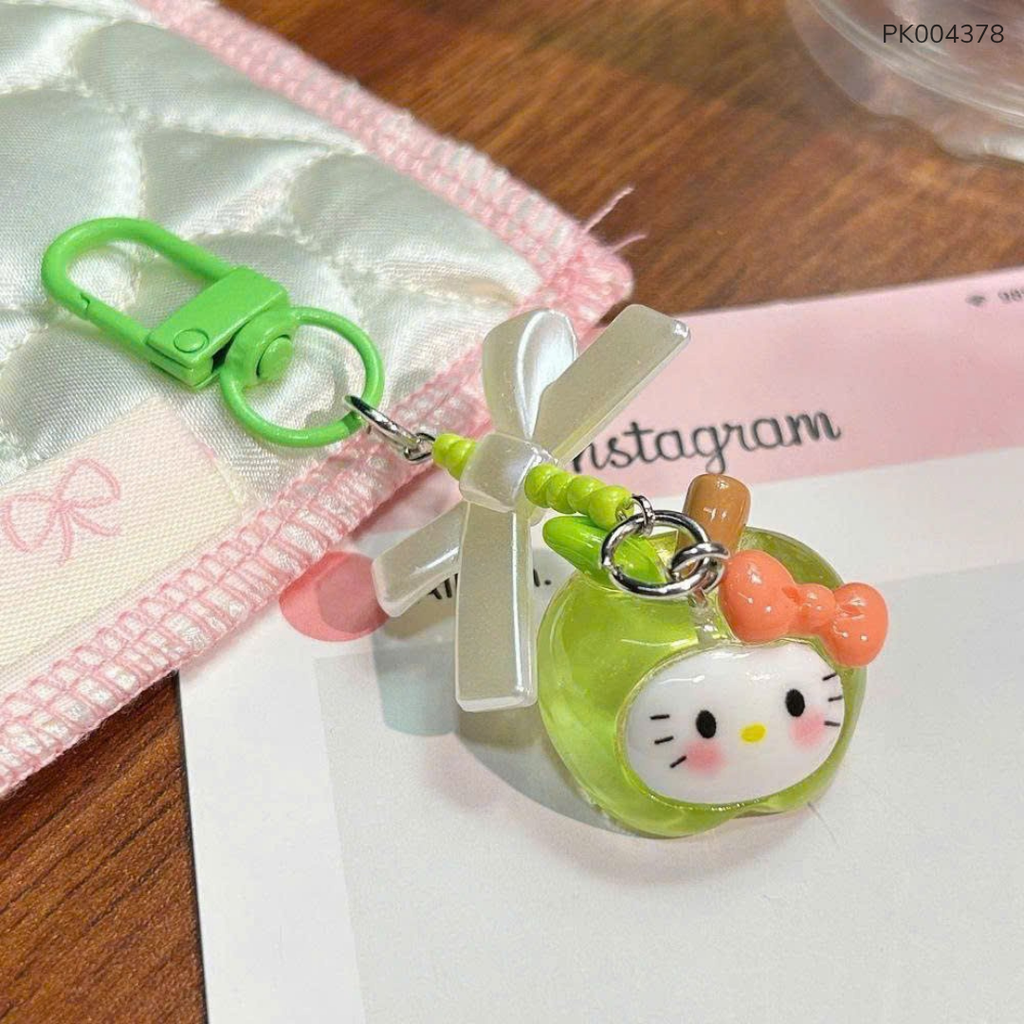 ** Móc khóa quả táo mặt Kitty nhiều màu