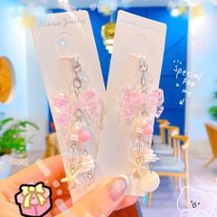 ** Móc khóa nơ hồng vò sò