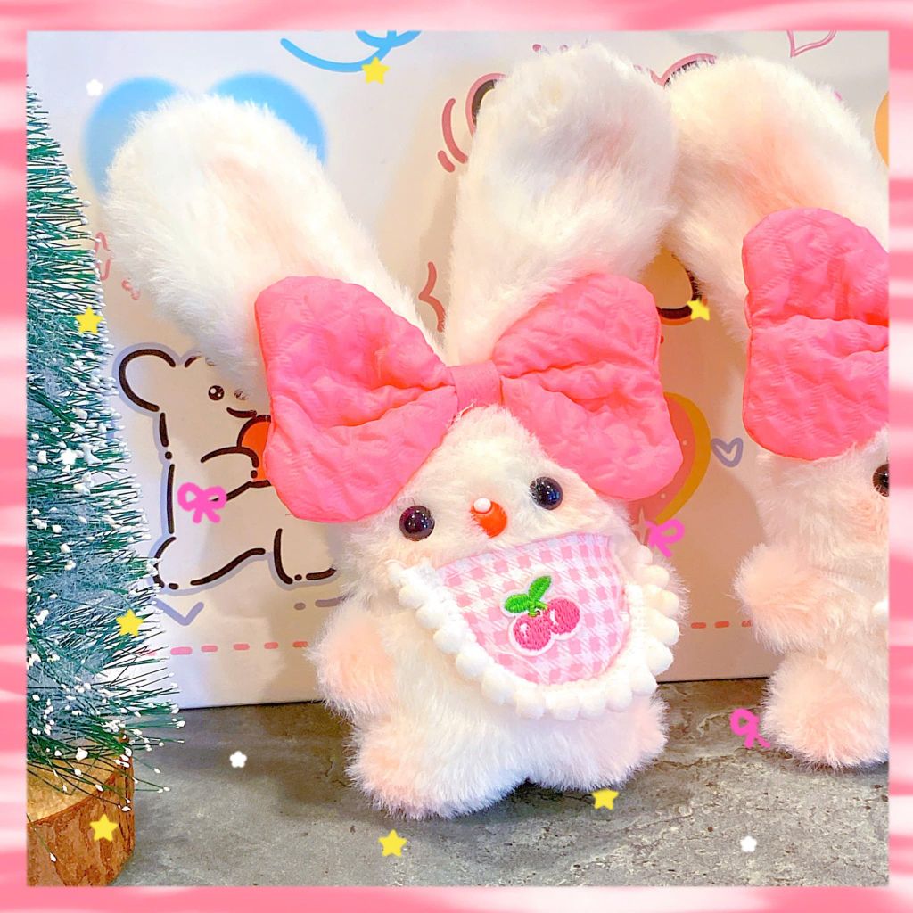 ** Móc khóa bông thỏ đeo nơ hồng