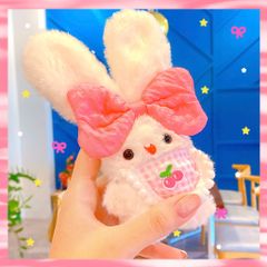 ** Móc khóa bông thỏ đeo nơ hồng