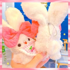 ** Móc khóa bông thỏ đeo nơ hồng