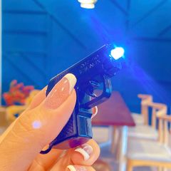 ** Móc khóa súng/máy ảnh bật đèn