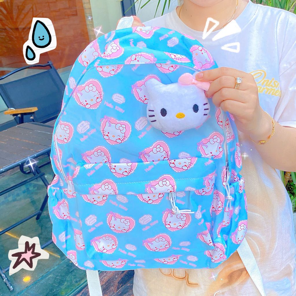 ** Balo Hello Kitty ghim mặt Kitty bông