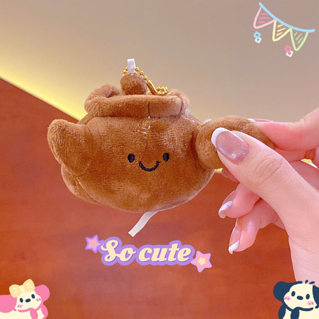 ** Móc khóa bông ấm trà nâu