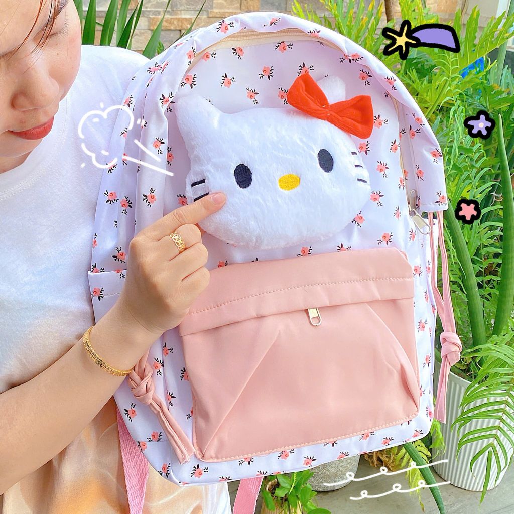 ** Balo mặt Kitty bông túi hồng