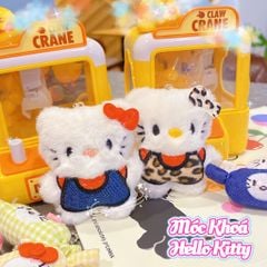 ** Móc khóa bông Kitty mặc áo xanh/beo