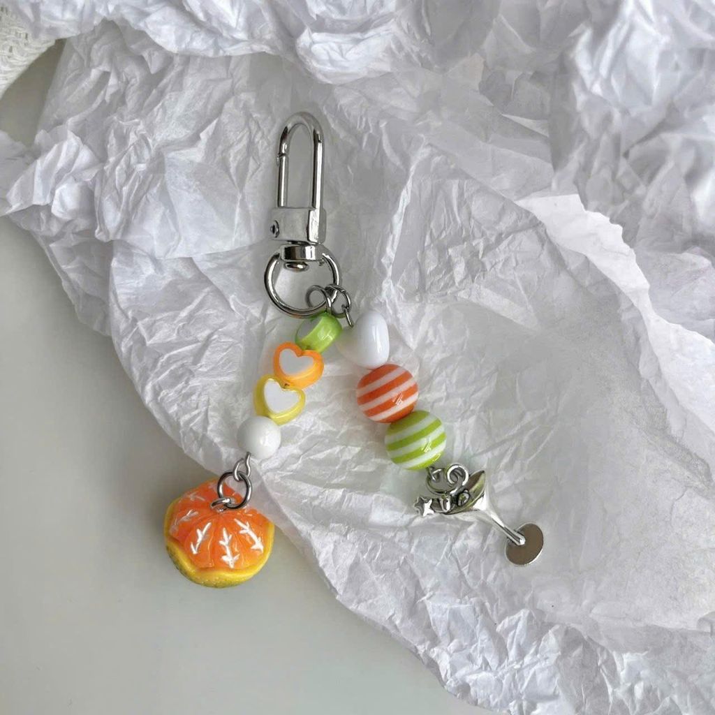 ** Móc khóa quả quýt lột vỏ