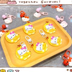 ** Móc khóa chuối đính mặt Kitty