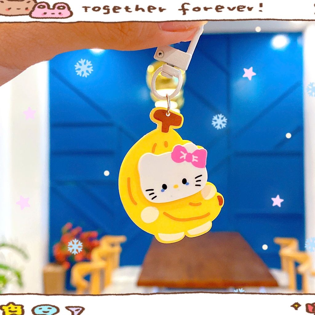 ** Móc khóa chuối đính mặt Kitty