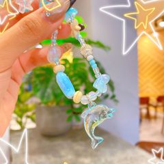 ** Dây đeo điện thoại cá heo xanh