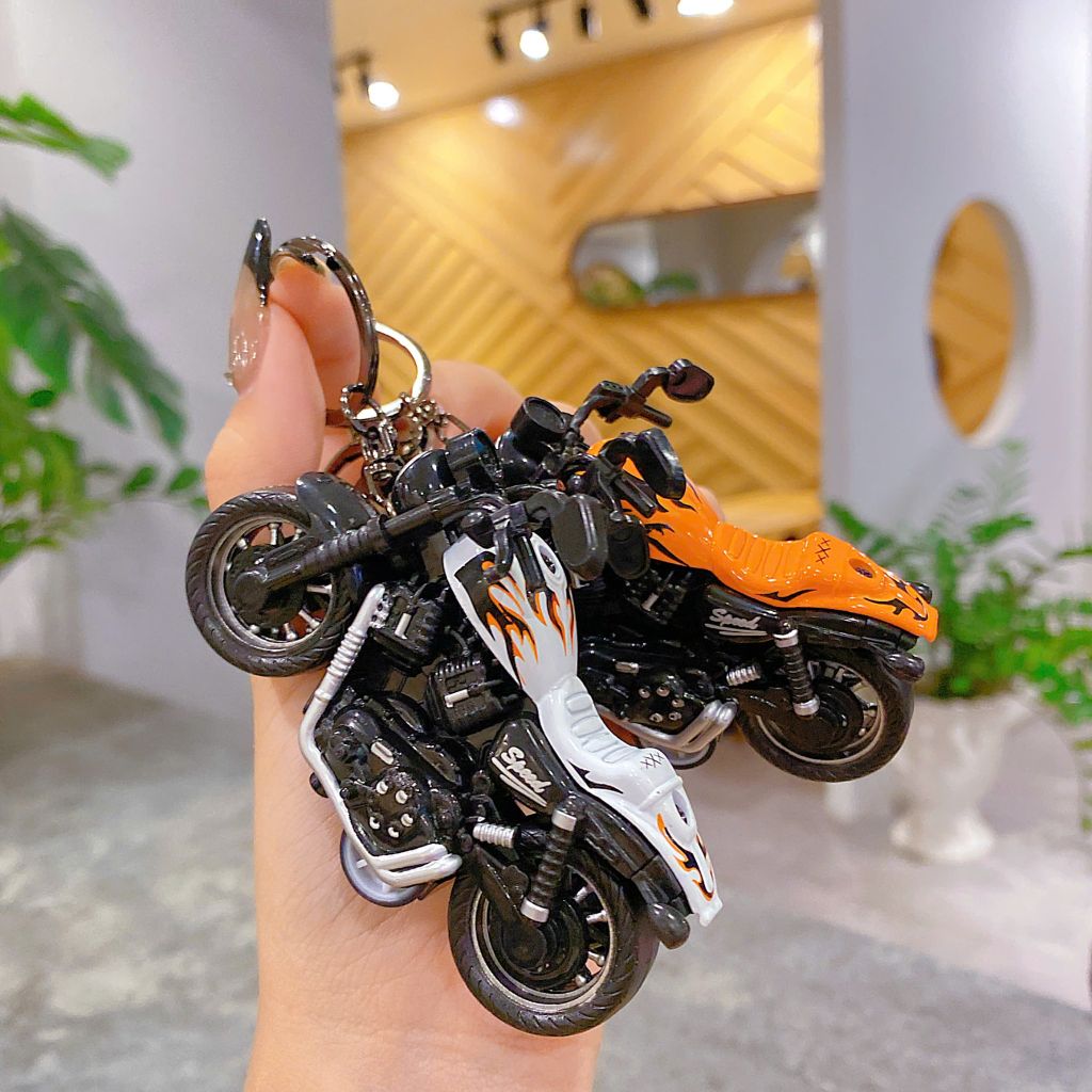 ** Móc khóa xe moto