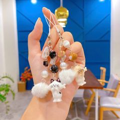 ** Dây đeo điện thoại mèo đầu cá ngang kèm charm bông