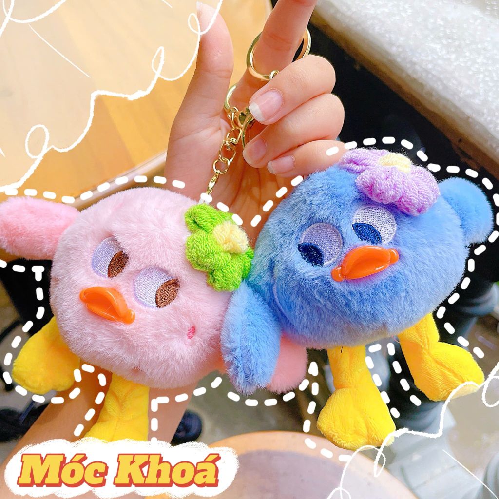 ** Móc khóa vịt chân dài cài hoa len hồng/vàng/XD/XL