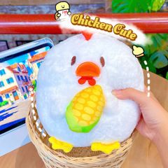 ** Gấu bông gà mỏ cam ôm bắp