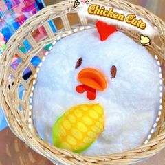 ** Gấu bông gà mỏ cam ôm bắp
