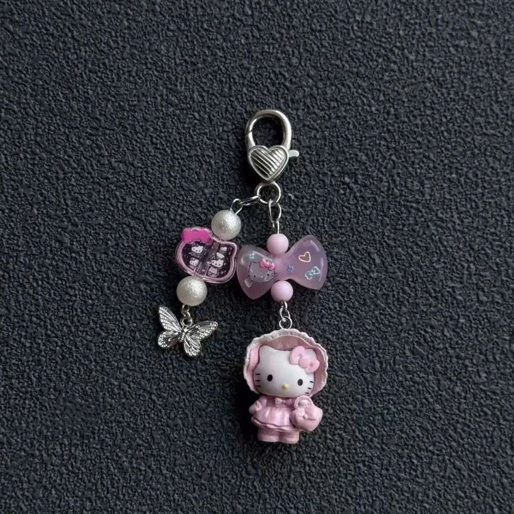 ** Móc khóa/dây đeo Kitty trắng/hồng kèm thẻ trong