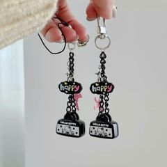 ** Móc khóa/dây đeo túi xách đen Happy