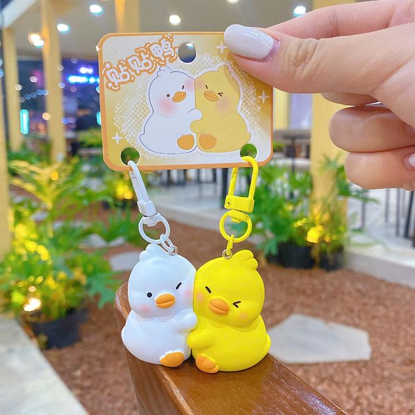 ** Móc khóa đôi gà yêu