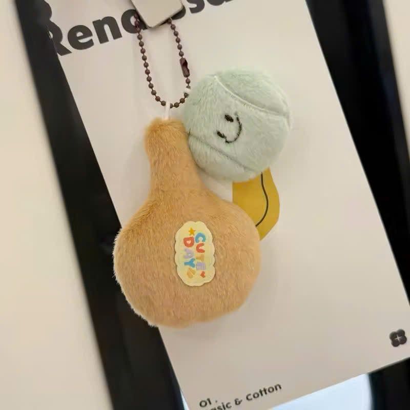 ** Set móc khóa bông vợt và bóng/cầu lông