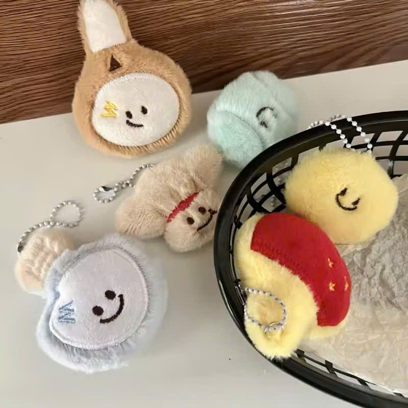 ** Set móc khóa bông vợt và bóng/cầu lông