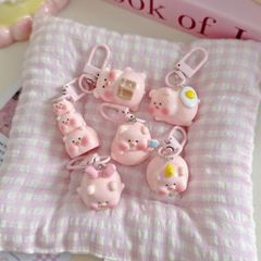 ** Móc khóa mini heo hồng chăm học ham ăn