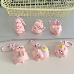 ** Móc khóa mini heo hồng chăm học ham ăn