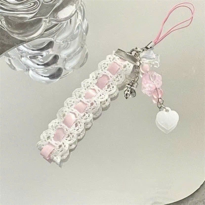 ** Dây đeo điện thoại tim gấu ruy băng hồng ren trắng