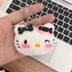 ** Móc khóa bông mặt Kitty đính kẹp xương cá