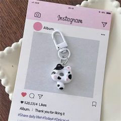 ** Móc khóa mini mèo ú bánh vòng