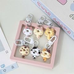 ** Móc khóa mini mèo ú bánh vòng