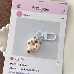 ** Móc khóa mini mèo ú bánh vòng