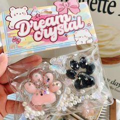 ** Slime 2 chân mèo thạch trong hồng/đen