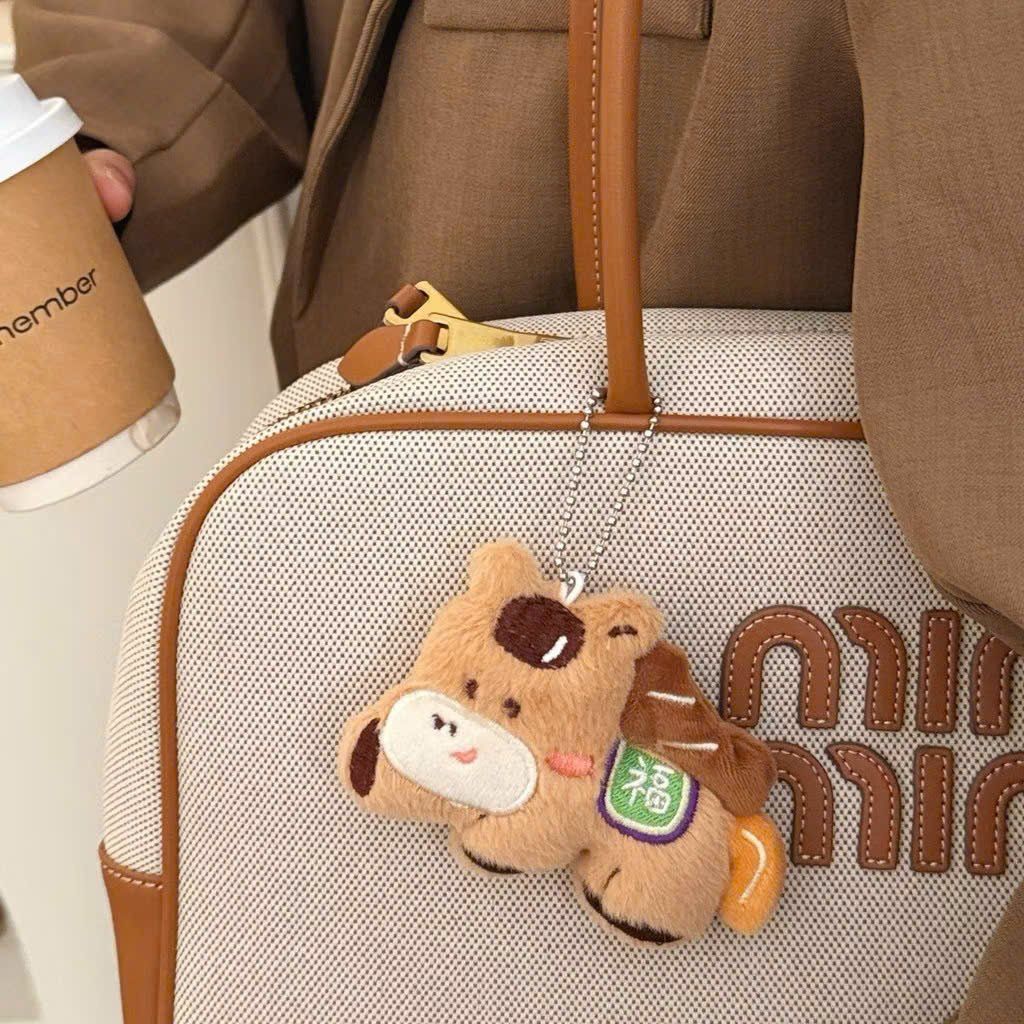 ** Móc khóa bông ngựa chân ngắn hồng/nâu